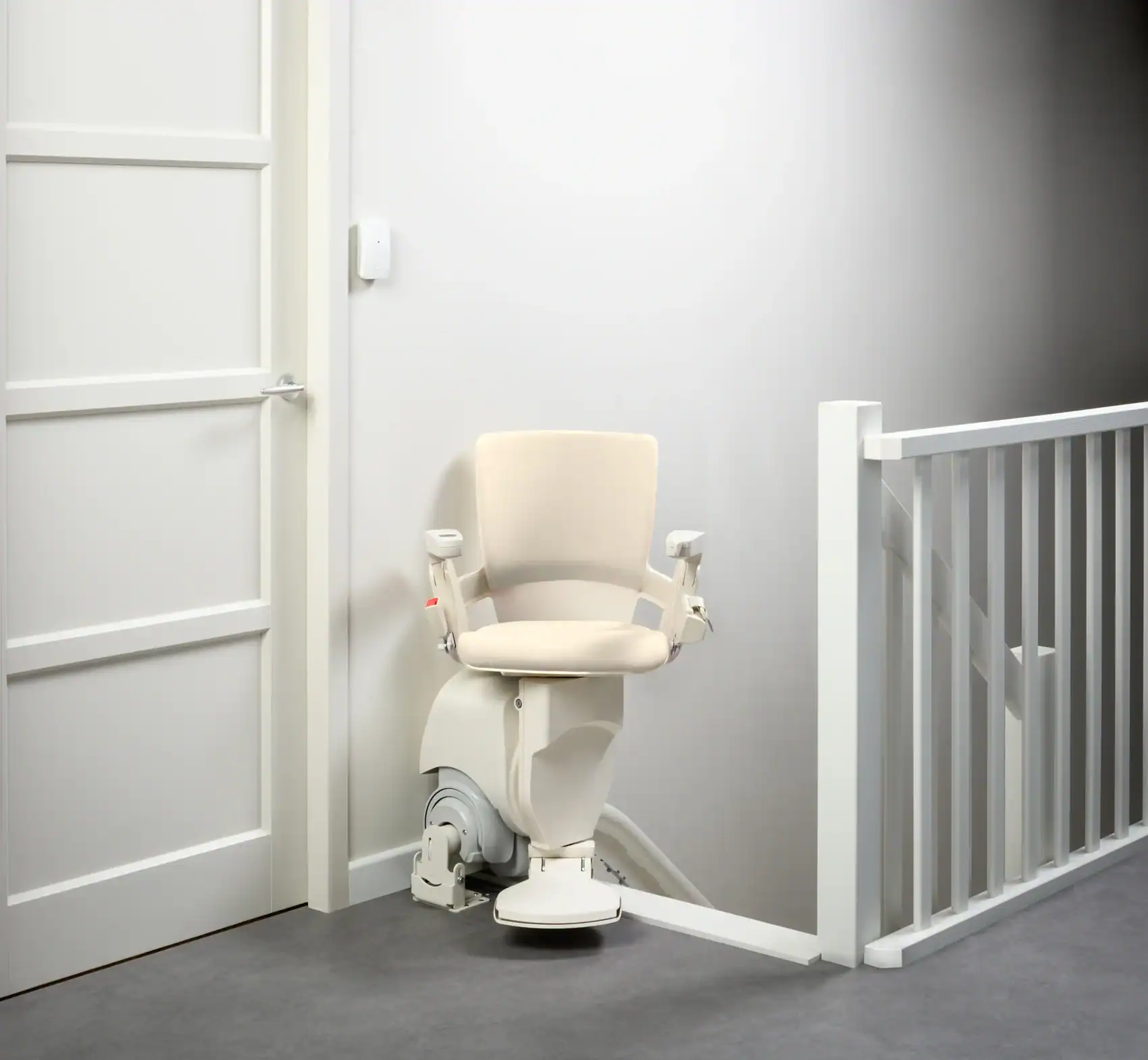 Cream white Otolift chair at the landing