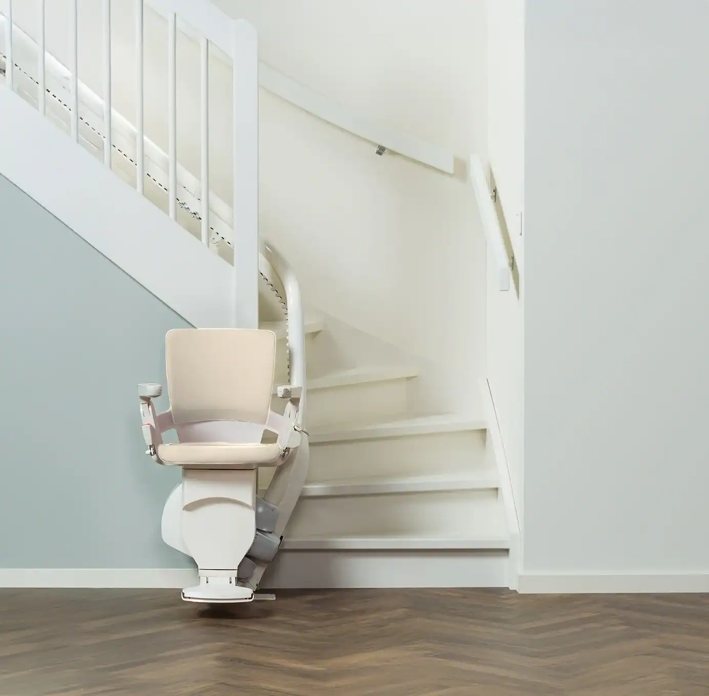 Otolift slim rail following a staircase